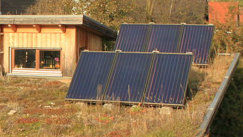 Solar thermal panels, green roof, eco home
